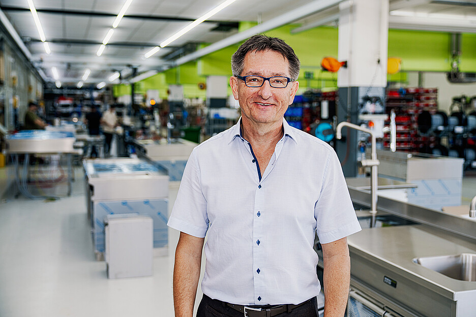 Fier de ses collaborateurs et de son entreprise: Dr Paul Schneider, propriétaire et directeur de Menu System AG.